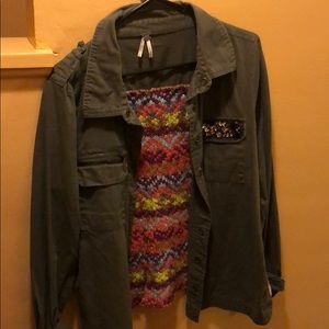 Green jacket with knitted back